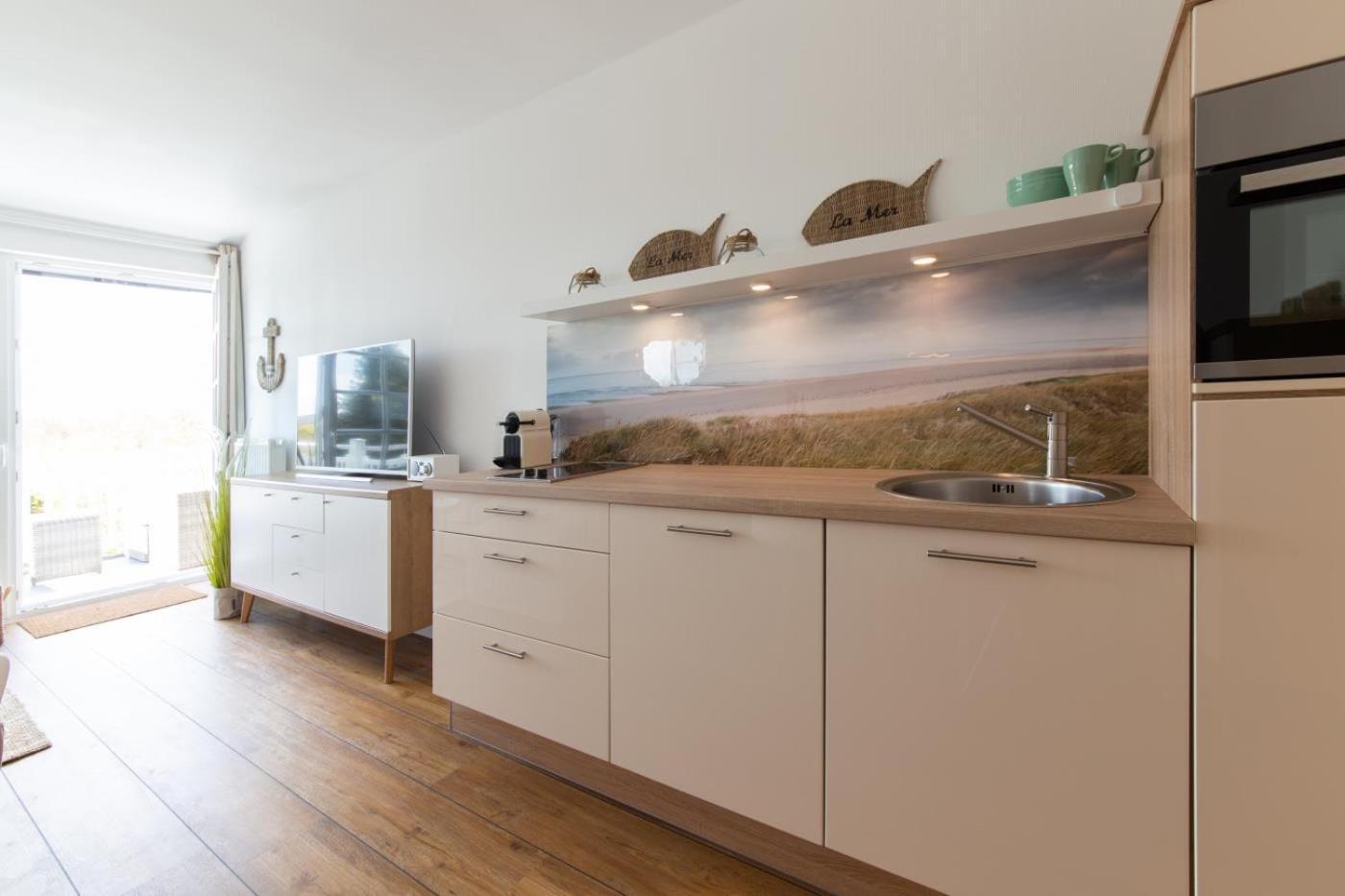 Ferienwohnung Kleine Strandkoje ฮัฟฟ์ครูก ภายนอก รูปภาพ